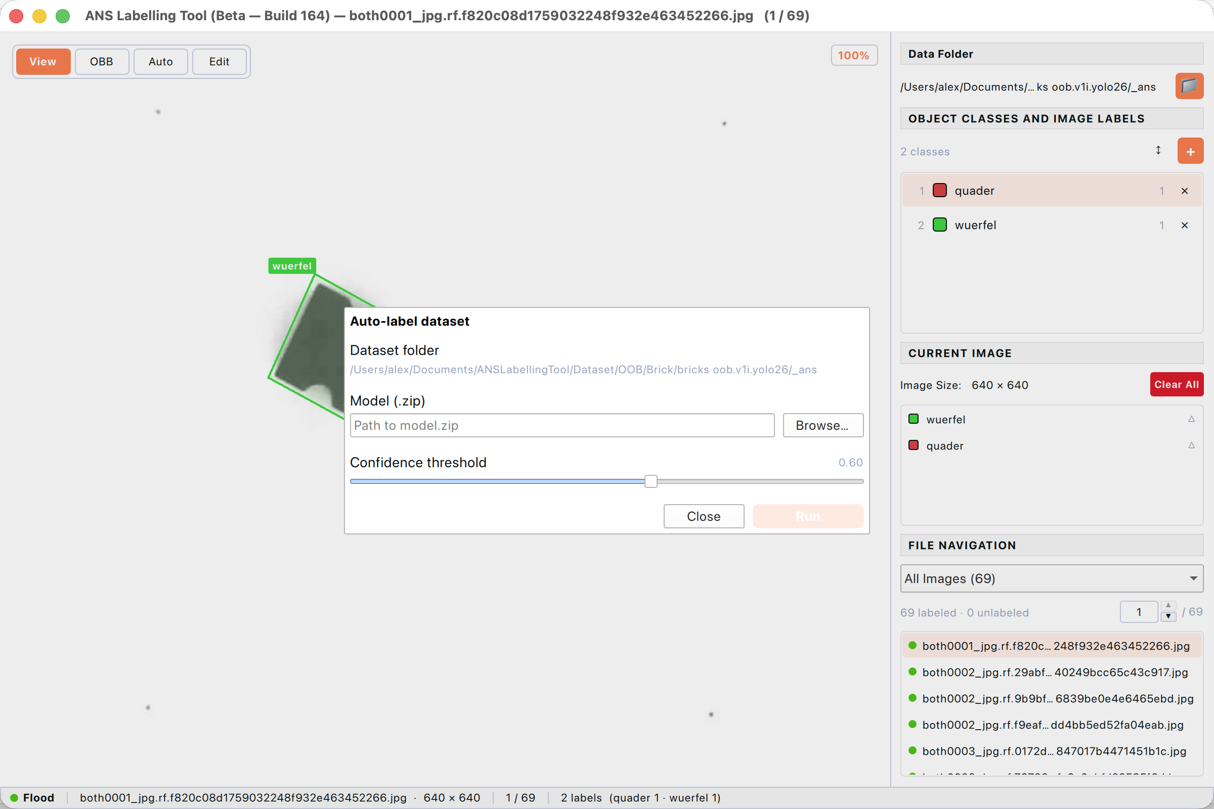 Auto-label dialog. Pick a model and a confidence threshold, then click Run.